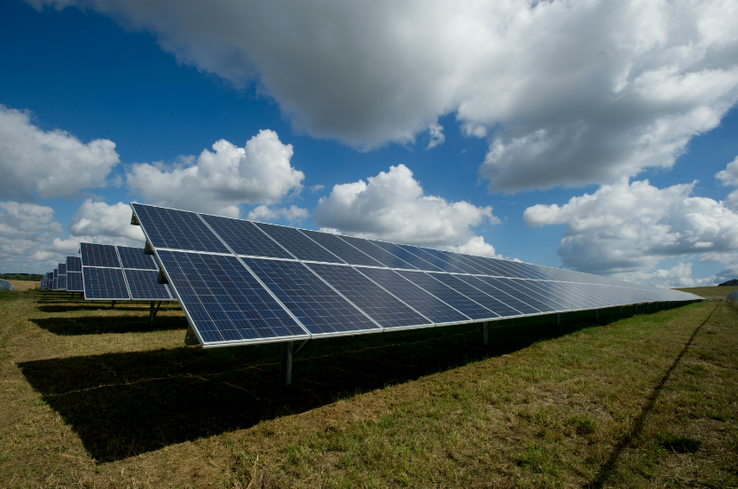 Solar panel with sunset in the background