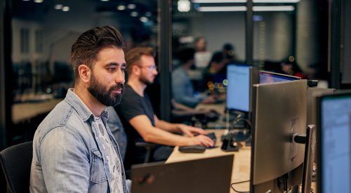 two people working at desk