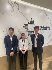 Two men and a woman in an office
