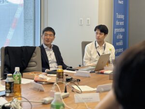 Man speaking at conference table