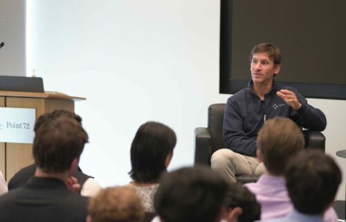 Man speaking to students