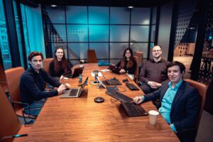 Workers at conference table