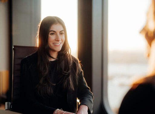 Photo of person sitting in a conference room