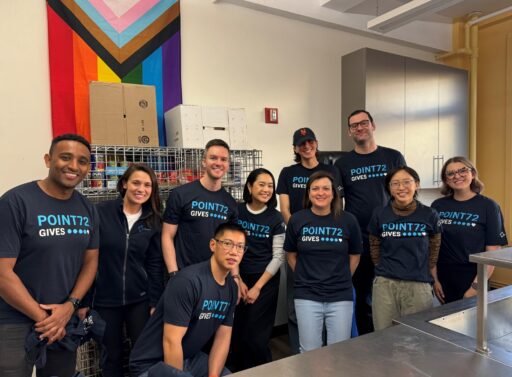 Photo of a group of employees at a volunteer event in a kitchen